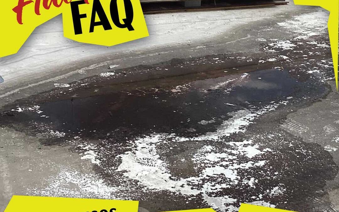 What causes ponding water on a flat roof?